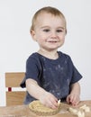 Child making cookies Royalty Free Stock Photo