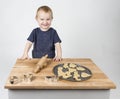 Child making cookies Royalty Free Stock Photo
