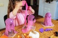 Child making gauze ghost Halloween craft, Cheesecloth Ghosts Royalty Free Stock Photo
