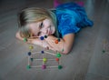 Child making geometric shapes, engineering and STEM Royalty Free Stock Photo