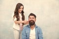 Child making hairstyle styling father beard. Being parent means present for kid interests. Change hairstyle. Create