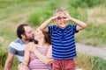 Child making pretend binoculars with hands Royalty Free Stock Photo