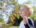 Child making soap bubbles outside Royalty Free Stock Photo