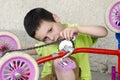 Child mechanic reparing