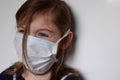 Child in a medical mask. Portrait, close-up.