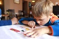 Child with menu book