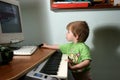 Child and MIDI Keyboard Royalty Free Stock Photo