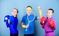 Child might excel completely different sport. Sporty siblings. Girls kids with boxing sport equipment and boy tennis