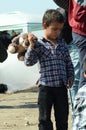Child migrants with toy