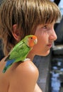 Child with Miniature Parrot