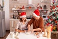 Child mixing cookies ingredients in bowl making traditional homemade dough Royalty Free Stock Photo