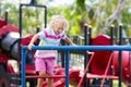 Child on monkey bars. Kid at school playground Royalty Free Stock Photo