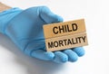 Child mortality inscription, infant death rate concept Royalty Free Stock Photo
