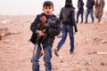 A Child From Mosul Fleeing The Fight With His Animal Royalty Free Stock Photo