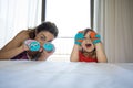 Child and mother playing with socks in their hands Royalty Free Stock Photo