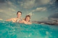 Child and mother in swimming pool Royalty Free Stock Photo