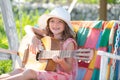 Child musician playing the guitar like a rockstar. Summer activity for children in warm weather. Cute little girl having Royalty Free Stock Photo