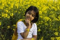 child and mustard flower in India Royalty Free Stock Photo