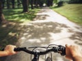 Child nands on the handlebar close up image