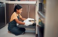 Child, nutrition and cookies tray in oven kitchen for baking, child development and learning cooking skills and happy in Royalty Free Stock Photo