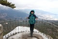 Child on observation deck of silver gazebo