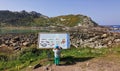 A child observes an information panel on animal diversity in the CÃÂ­es Islands, Vigo, Pontevedra, Galicia, Spain