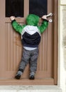 Child opening door