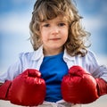 Child opening his shirt like a superhero Royalty Free Stock Photo