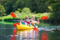 Child on kayak. Kids on canoe. Summer camping. Royalty Free Stock Photo