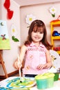 Child paint picture in preschool. Royalty Free Stock Photo