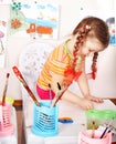 Child paint picture in preschool. Royalty Free Stock Photo