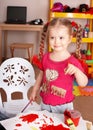 Child paint picture in preschool. Royalty Free Stock Photo