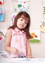 Child paint picture in preschool. Royalty Free Stock Photo