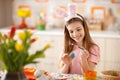 Child painting egg for Easter Royalty Free Stock Photo