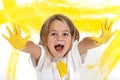 Child painting with his yellow hands