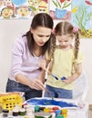 Child painting in preschool. Royalty Free Stock Photo