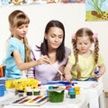 Child painting in preschool. Royalty Free Stock Photo