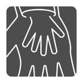 Child palm in adult hand solid icon, Children protection symbol , Two hands silhouette vector sign on white background Royalty Free Stock Photo