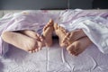 Child with parents sleeping together on the bed Royalty Free Stock Photo