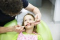 Child patient on her regular dental checkup