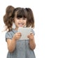 Child with pen and blank paper book on empty banner on which you can write any text. Royalty Free Stock Photo