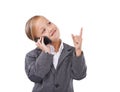 Child, phone call and business suit for play dress up in studio for future, connection or white background. Female Royalty Free Stock Photo