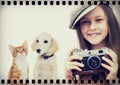 Child photographer and kitten and puppy