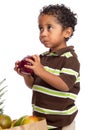 Child Picking Apple from Grocery Bag Royalty Free Stock Photo