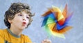 Child and a pinwheel Royalty Free Stock Photo