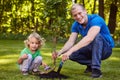 Child planting tree seedling