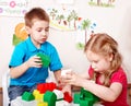 Child play construction set in classroom. . Royalty Free Stock Photo