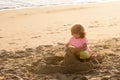 Child play with sand on summer beach. Kid build sandcastle. Kids summer vacation. Royalty Free Stock Photo