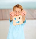 Child, playful or face food or bread funny, nutrition hungry or eating health value. Boy, diet or brown fibre for kid Royalty Free Stock Photo