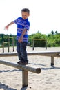 Child in playground, kid in action playing Royalty Free Stock Photo